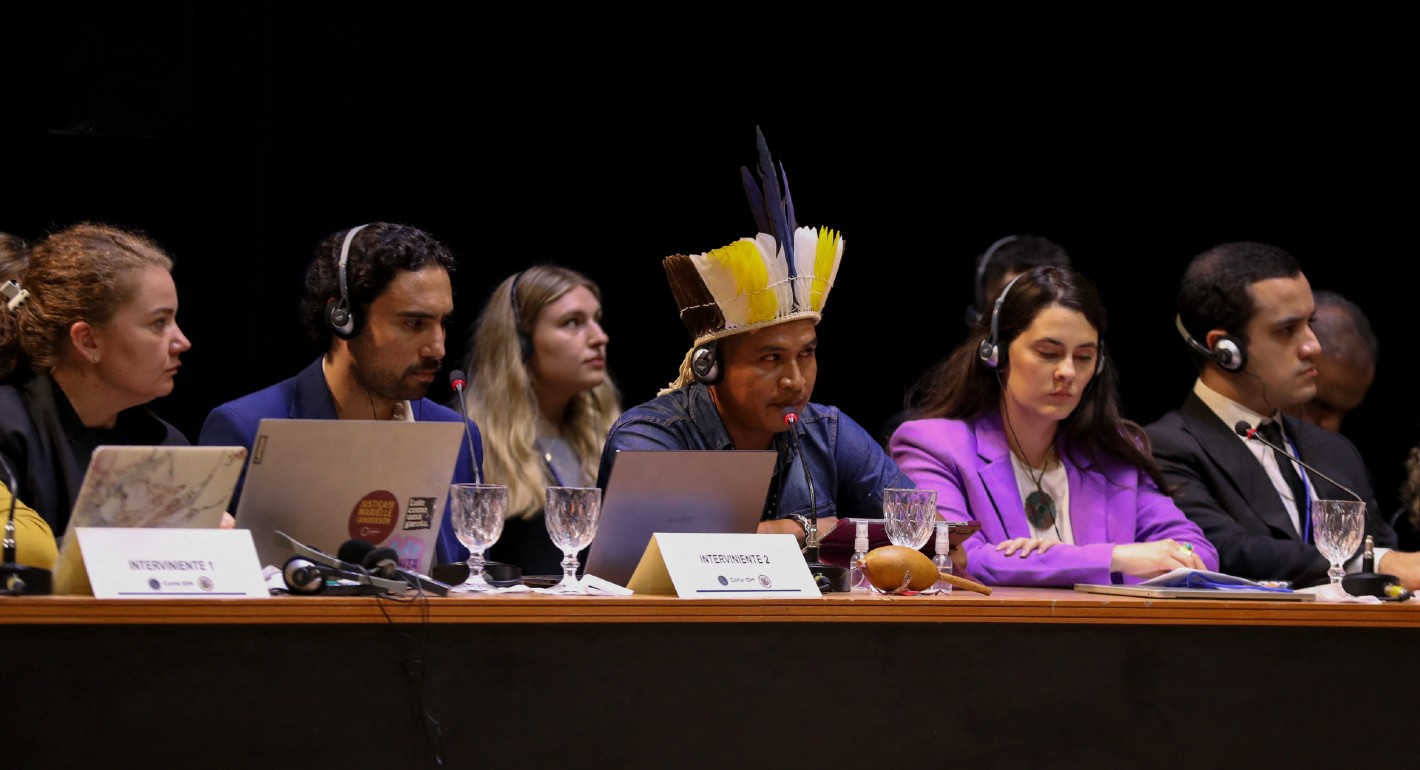 A member of the Guarani-Kaiowa ethnic group (C) attends a hearing on the responsibility of states in the face of climate emergencies, organised by the Inter-American Court of Human Rights