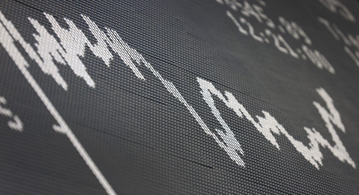 A display showing a chart of the German share index DAX is pictured at the stock exchange in Frankfurt am Main, western Germany, on June 5, 2024