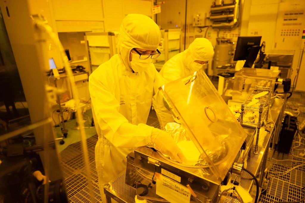 Caption: Tokyo University PhD student conducting semiconductor research at Tokyo University. Japan is known for its robust semiconductor research and development. (Source: Photo by YUICHI YAMAZAKI/AFP via Getty Images) 