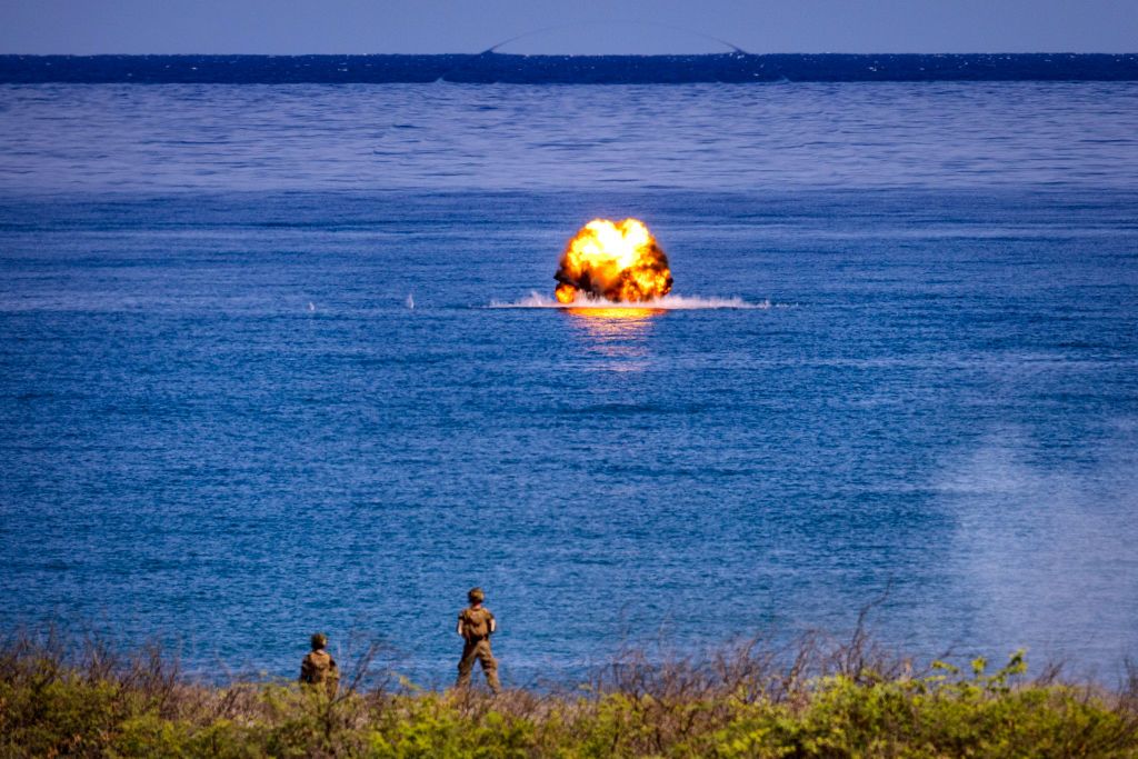 U.S. troops watch as a Javelin missile hits a target at sea during a live fire exercise as part of the 2024 Balikatan U.S.-Philippines joint military exercises.( Source: Photo by Ezra Acayan/Getty Images) 