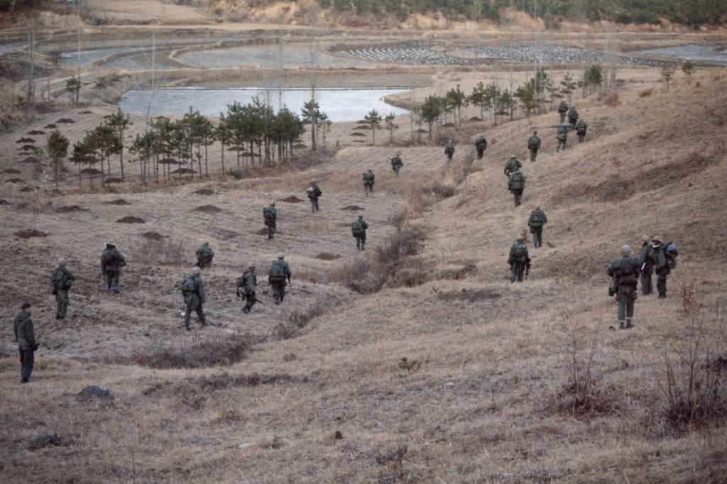 U.S. soldiers of the Second Infantry Division during a training session in 1975 near Camp Casey in South Korea, 15 miles from the Demilitarized Zone separating North and South Korea. (Photo by UPI/ Bettmann Archive/Getty Images)