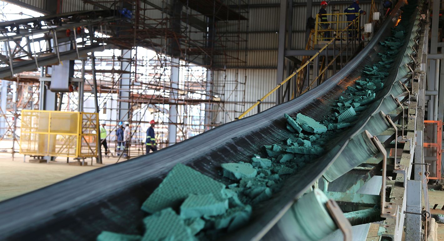 A conveyor belt carries chunks of Raw cobalt after a first transformation at a plant in Lubumbashi on February 16, 2018, before being exported, mainly to China, to be refined.