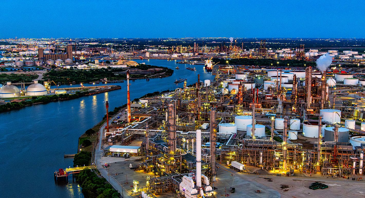 Aerial view of refineries and other industry along the Buffalo Bayou, dredged to create the Houston Ship Channel located about 5 miles east of downtown Houston, Texas shot via helicopter from an altitude of about 500 feet.
