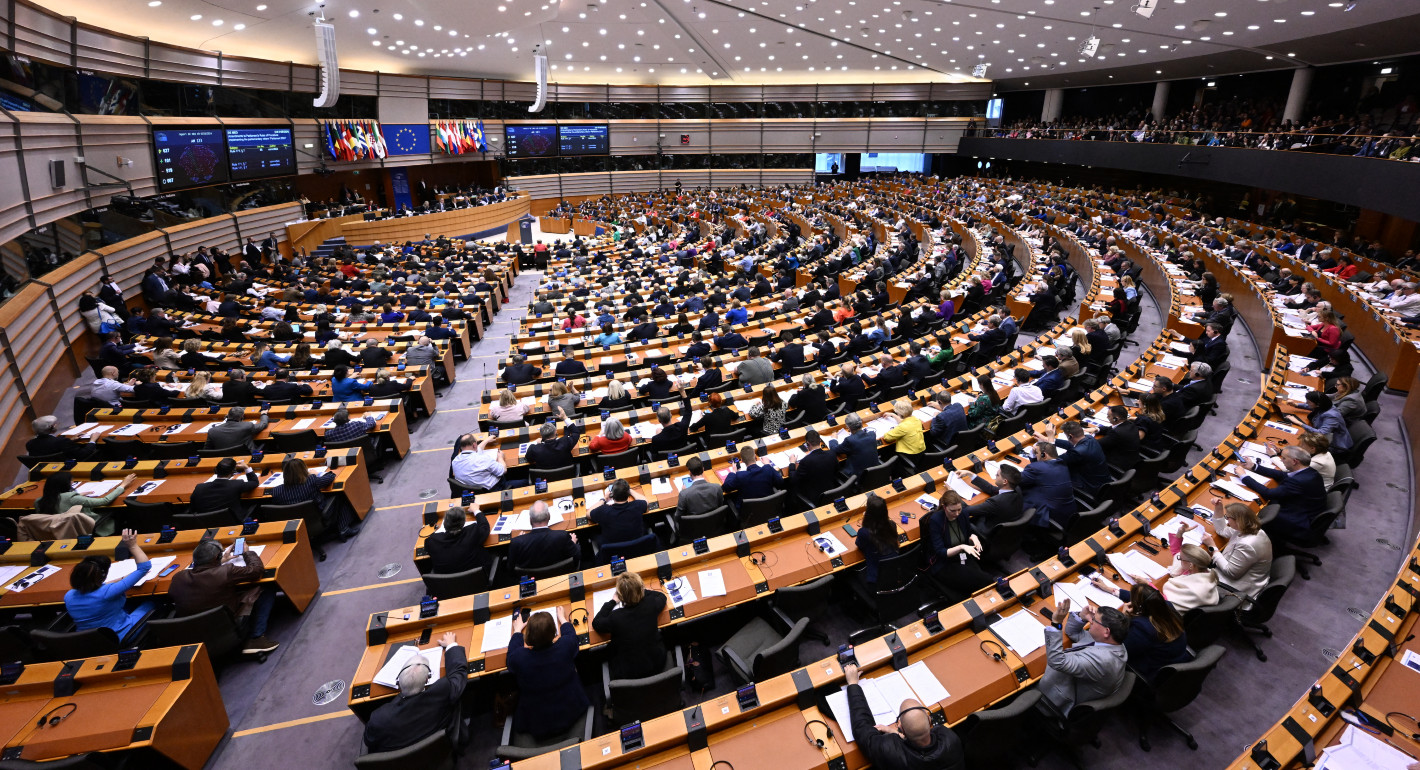 Wide shot of a European Parliament session, from the back of the room