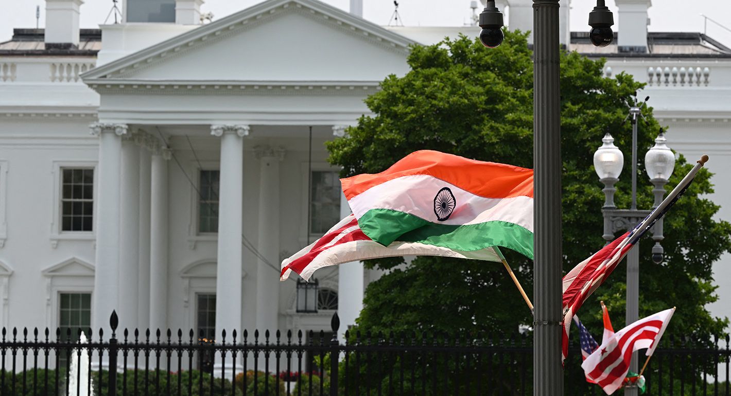 Indian and U.S. flags outside the White House