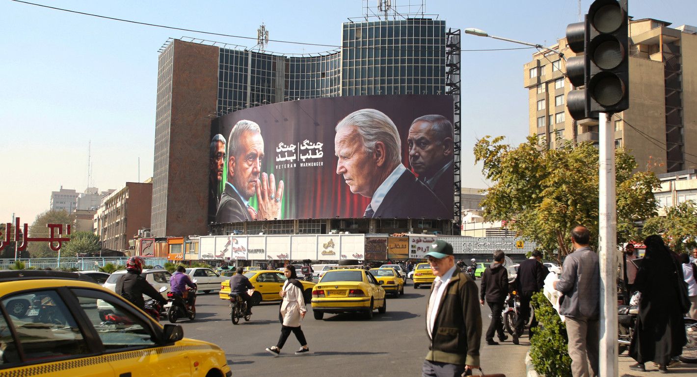 Billboard showing US and Iranian leaders in Tehran