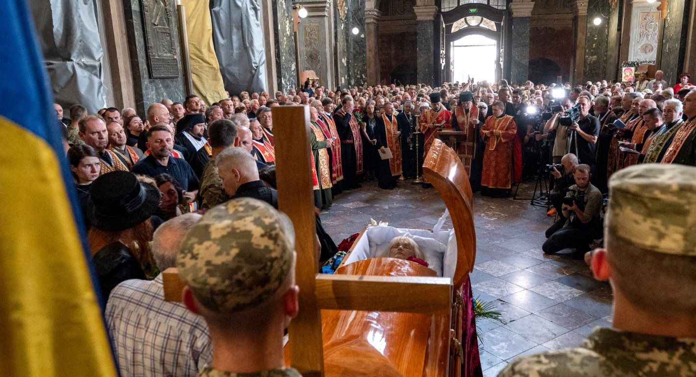 Mourners attend a funeral service for former Ukrainian nationalist lawmaker Iryna Farion, who died after being shot by a gunman, at the Saints Peter and Paul Garrison Church in Lviv on July 22, 2024, amid the Russian invasion of Ukraine.