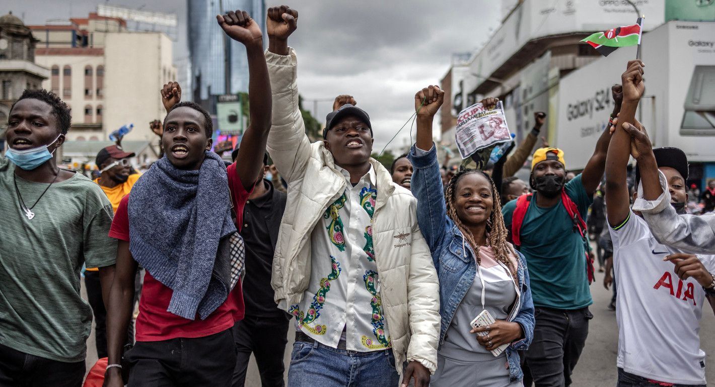 People marching with raised fists