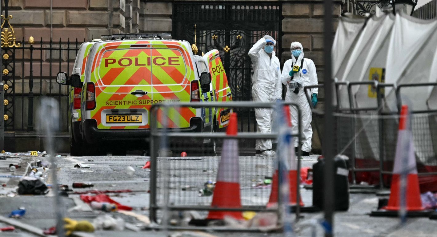 Police officers surveying a crime scene