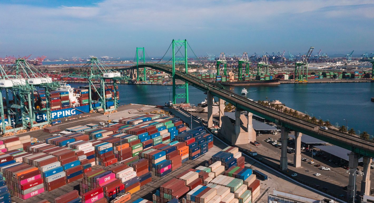 Port of San Pedro in Los Angeles CA with San Vicente Bridge in the Long Beach area with shipping containers