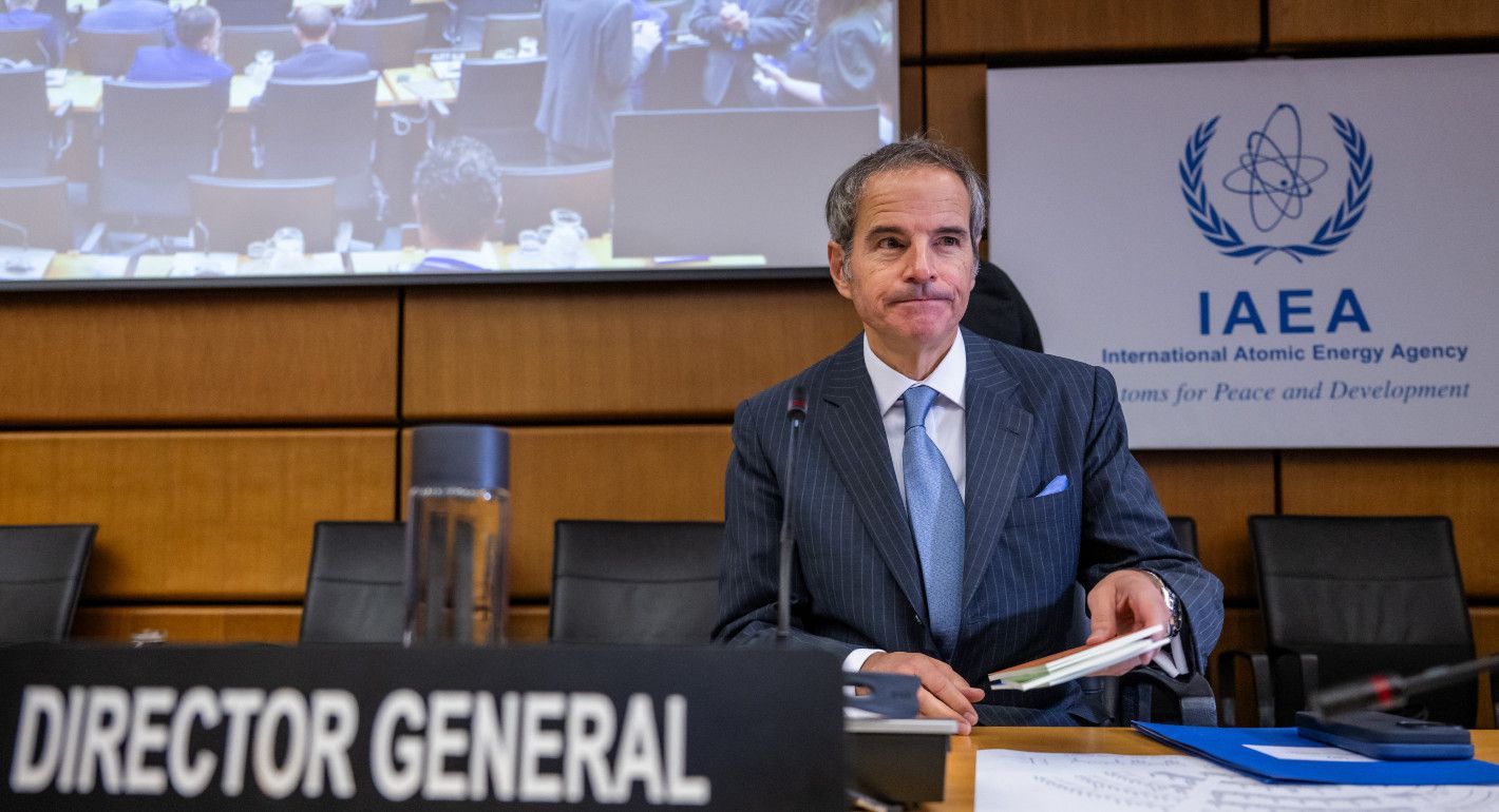 A man sitting in a conference room
