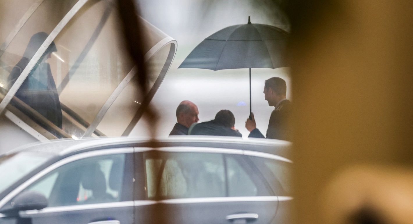 German Chancellor Olaf Scholz gets off an airplane as he arrives to deliver a press statement at the Cologne/Bonn international airport in Cologne, western Germany on August 1, 2024, after German political prisoners have been released in one of the biggest prisoner swaps between Russia and the West since the end of the Cold War. A total of 26 people, including two minors, from the United States, Germany, Poland, Slovenia, Norway, Belarus and Russia are involved in one of the biggest East-West prisoner swaps since the Cold War.