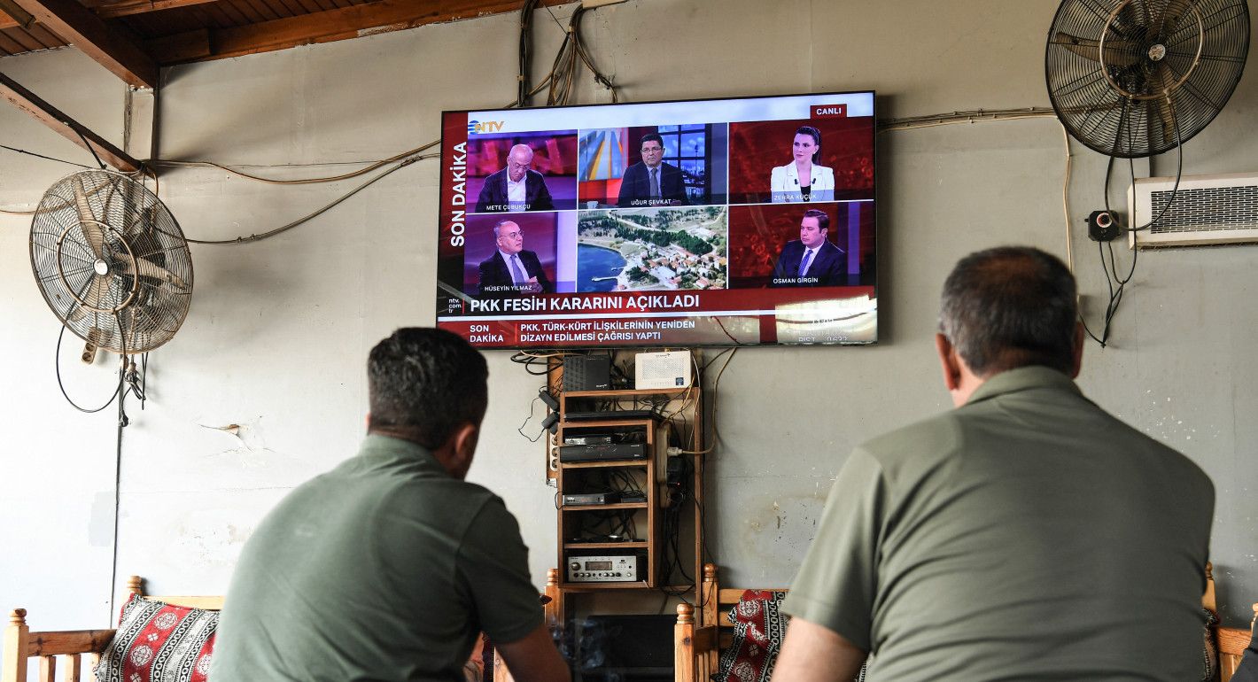 Men watching TV