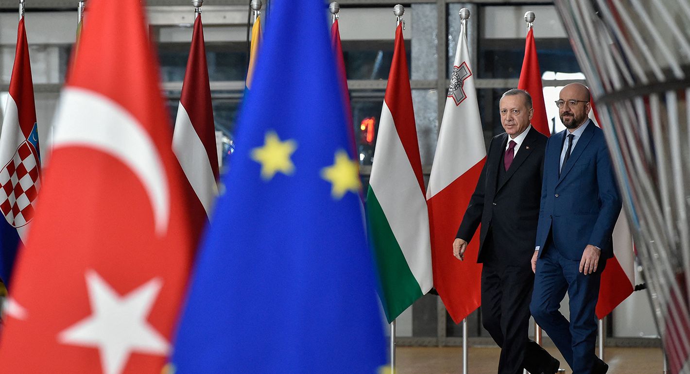 U Council President Charles Michel (R) arrives with Turkish President Recep Tayyip Erdogan before a meeting with European Commission President Ursula von der Leyen at the EU headquarters in Brussels on March 9, 2020. 