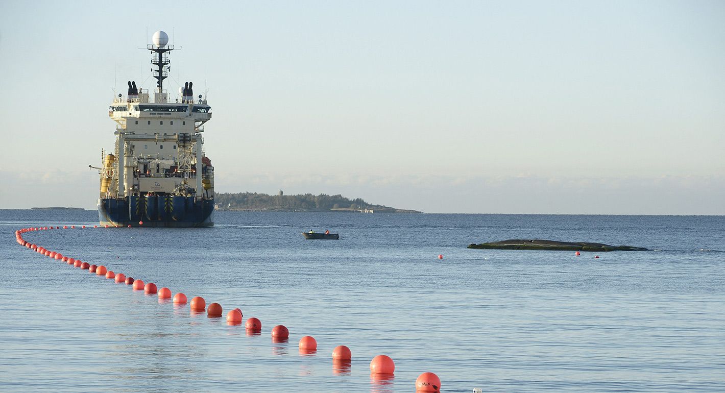 This picture taken on October 12, 2015 shows the C-Lion1 submarine telecommunications cable being laid to the bottom of the Baltic Sea by cable laying ship "Ile de Brehat" off the shore of Helsinki, Finland.