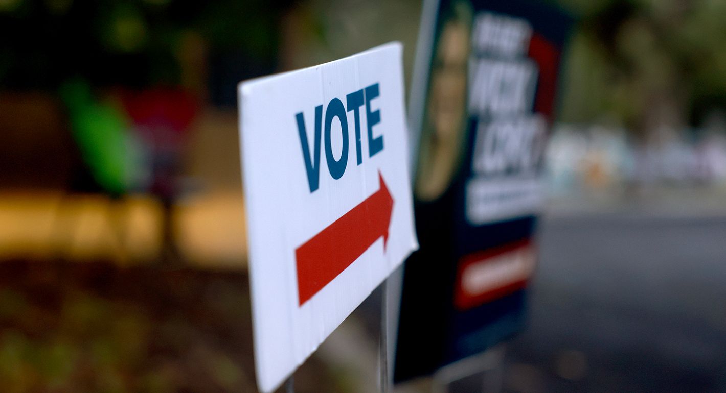  Vote sign outside of a polling station as early voting begins on October 21, 2024, in Miami, Florida. Early voting runs from Oct. 21 through Nov. 3 in Miami-Dade and Broward. People head to the polls to decide, among other races, the next president of the United States. 