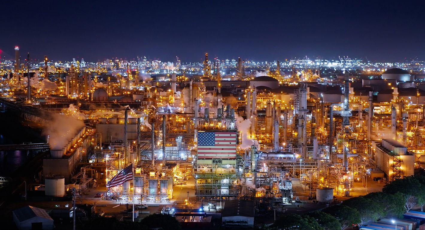 Aerial View of Oil Refinery with a big U.S. flag in Wilmington, California 
